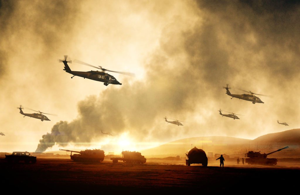 tanks and helicopters in the desert