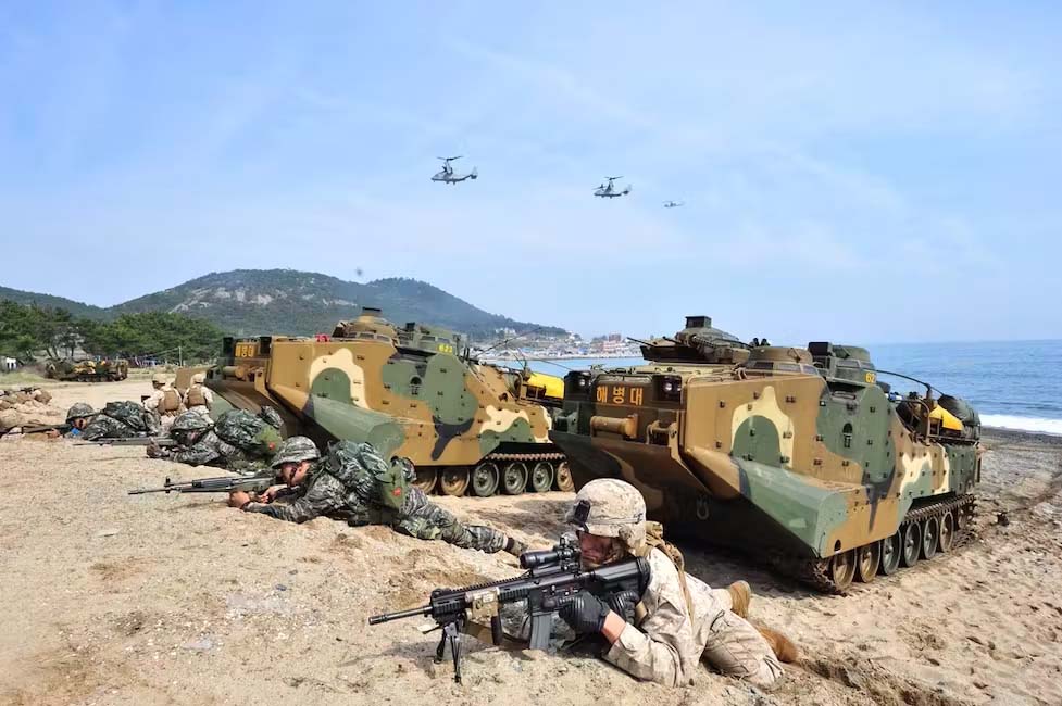 Military infantry storming a beach